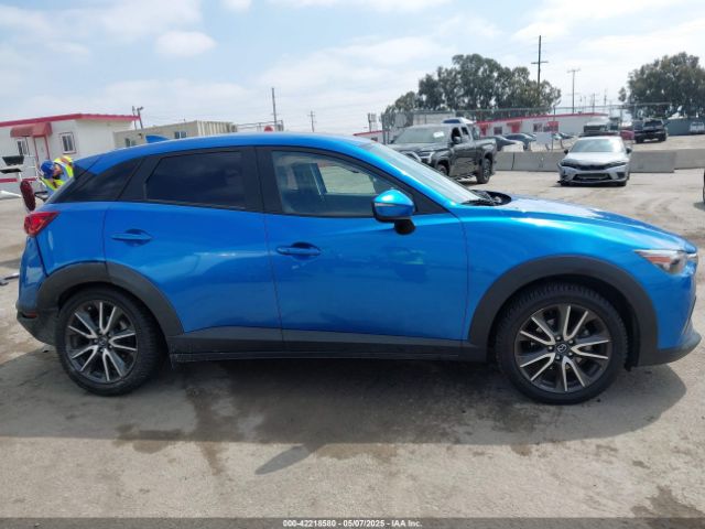 JM1DKFC77H0148553 Mazda Cx-3 Touring