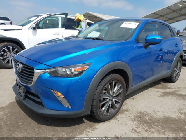 JM1DKFC77H0148553 Mazda Cx-3 Touring