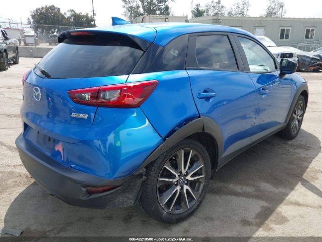 JM1DKFC77H0148553 Mazda Cx-3 Touring