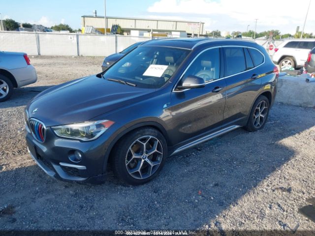 2016 BMW X1 WBXHT3C30GP886097 Photo 1