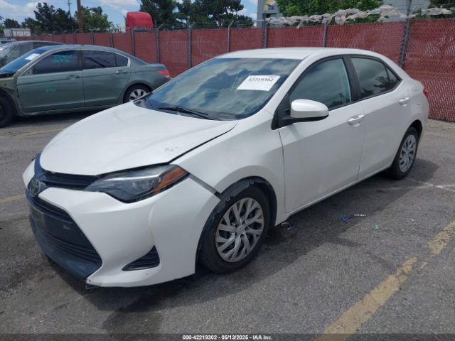 5YFBURHE8JP769404 Toyota COROLLA LE