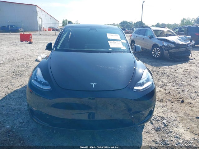 Auction sale of the 2023 Tesla Model Y Awd/long Range Dual Motor All-wheel Drive, vin: 7SAYGDEEXPA027342, lot number: 42219502