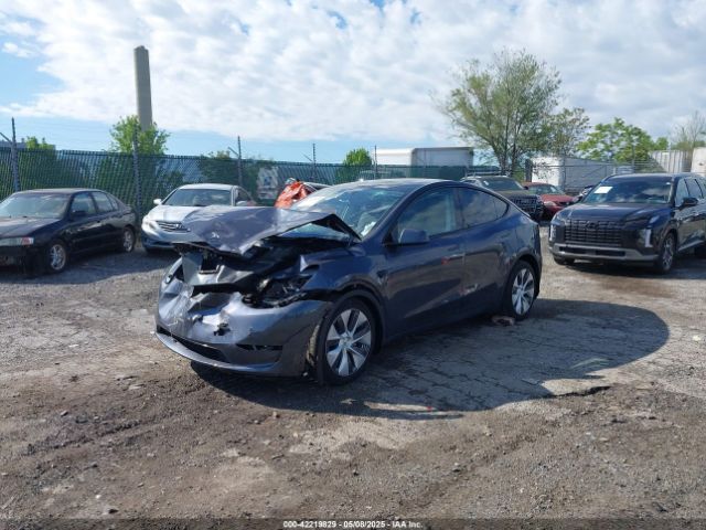 2023 TESLA MODEL Y 7SAYGDEEXPF890001 Photo 1