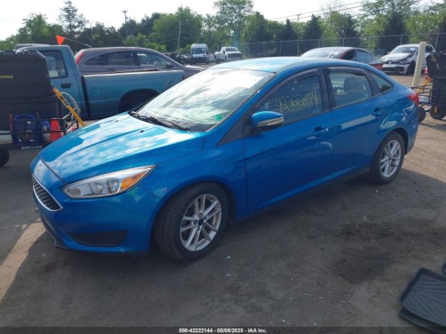 2015 FORD FOCUS 1FADP3F22FL378079 Photo 1