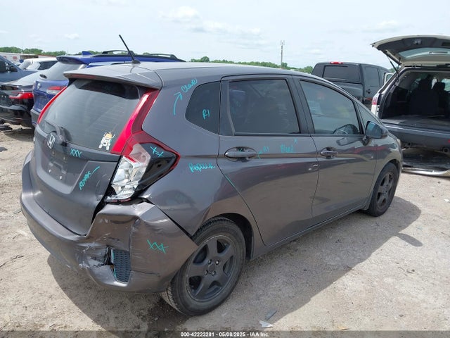 JHMGK5H59GX033309 Honda FIT LX