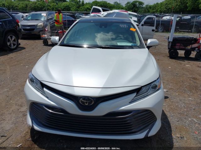 4T1B11HK2KU724975 Toyota CAMRY XLE