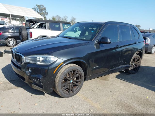 2018 BMW X5 5UXKR2C58J0X09826 Photo 1