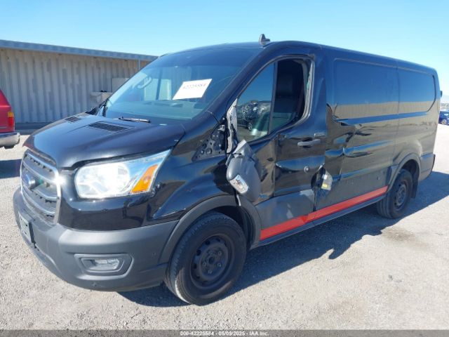 1FTYE1Y82LKA27214 Ford Transit-150 Cargo Van