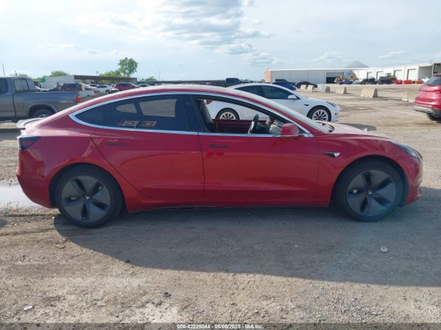 5YJ3E1EA1JF058031 Tesla 2018