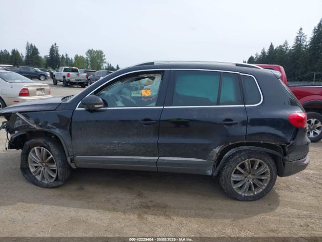 WVGBV3AX0EW565615 Volkswagen TIGUAN SE