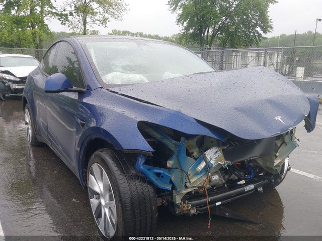 2023 TESLA MODEL Y 7SAYGDEE0PA130639 Photo 0