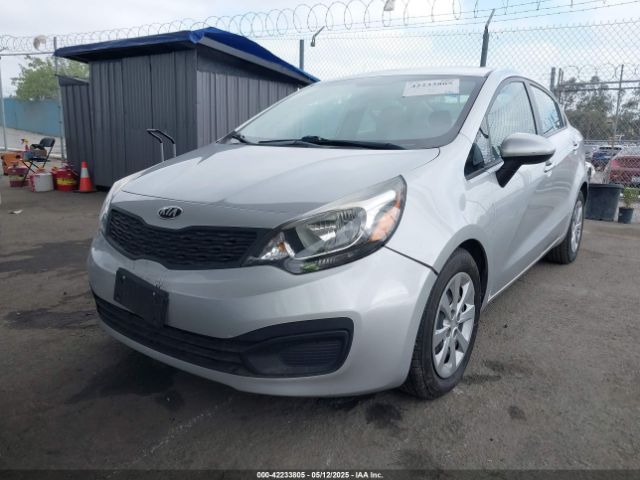 KNADM4A39E6335975 KIA RIO LX