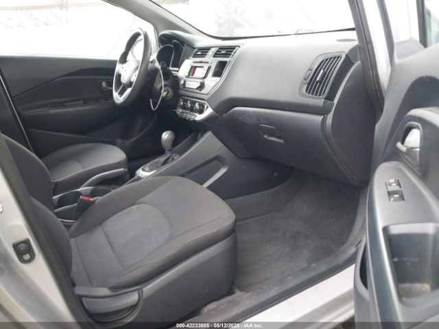 KNADM4A39E6335975 KIA RIO LX