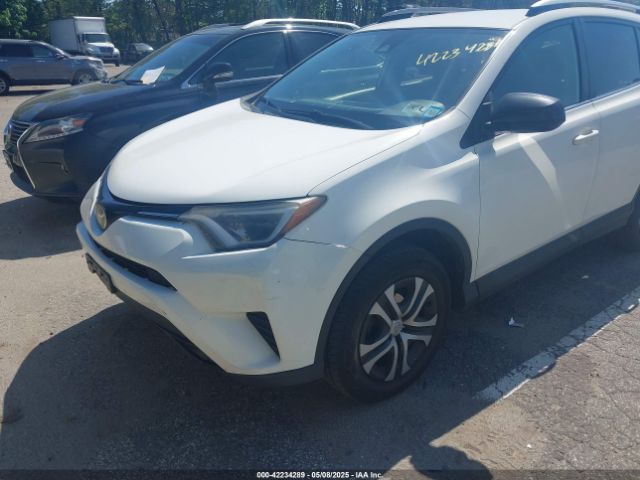 JTMBFREV4HJ112595 Toyota RAV4 LE