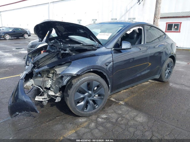 2024 TESLA MODEL Y 7SAYGDED5RF192695 Photo 1