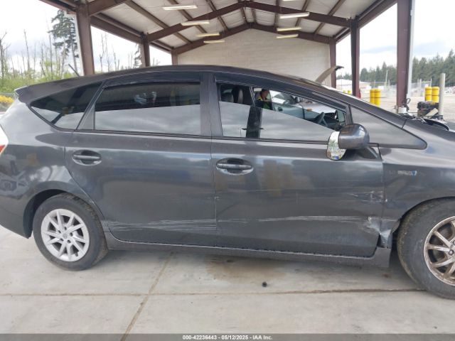 JTDZN3EU1EJ000354 Toyota Prius V Three