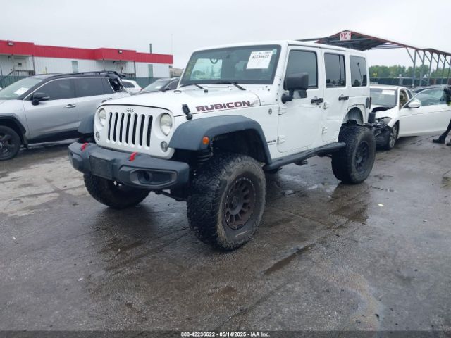 2014 JEEP WRANGLER UNLIMITED 1C4HJWFG4EL104827 Photo 1