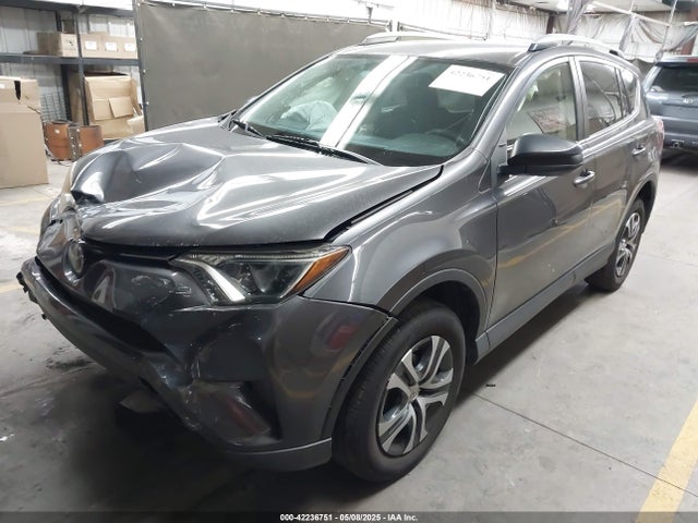 JTMZFREVXJJ750970 Toyota RAV4 LE
