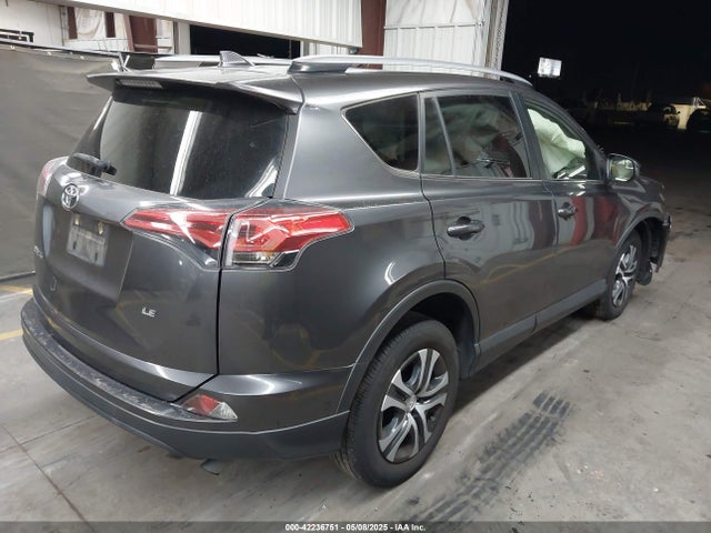 JTMZFREVXJJ750970 Toyota RAV4 LE