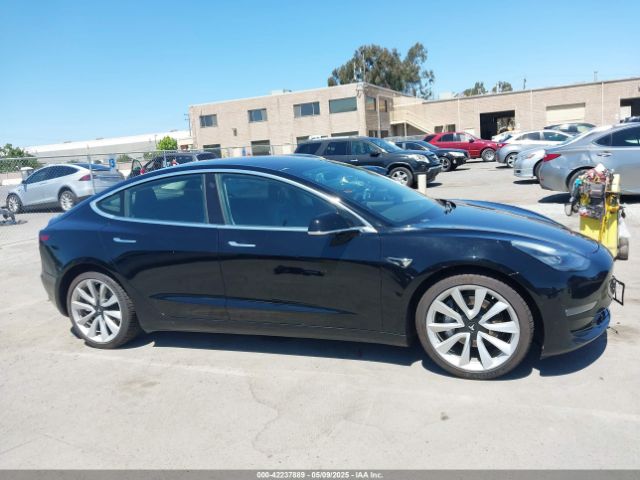 5YJ3E1EA1KF310717 Tesla 2019