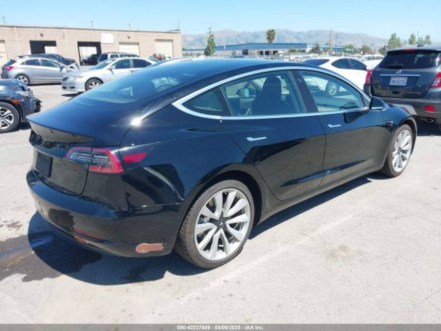 5YJ3E1EA1KF310717 Tesla 2019