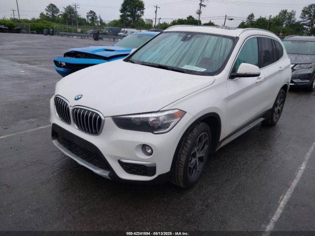 2019 BMW X1 WBXHT3C54K3H35641 Photo 1