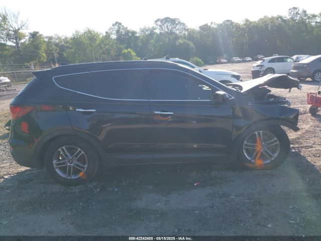 5NMZU3LB8HH031180 Hyundai Santa Fe Sport 2.4l