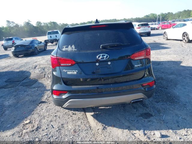 5NMZU3LB8HH031180 Hyundai Santa Fe Sport 2.4l