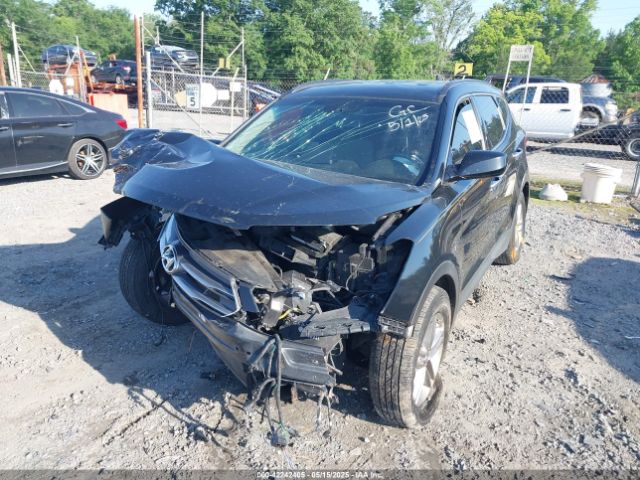 5NMZU3LB8HH031180 Hyundai Santa Fe Sport 2.4l