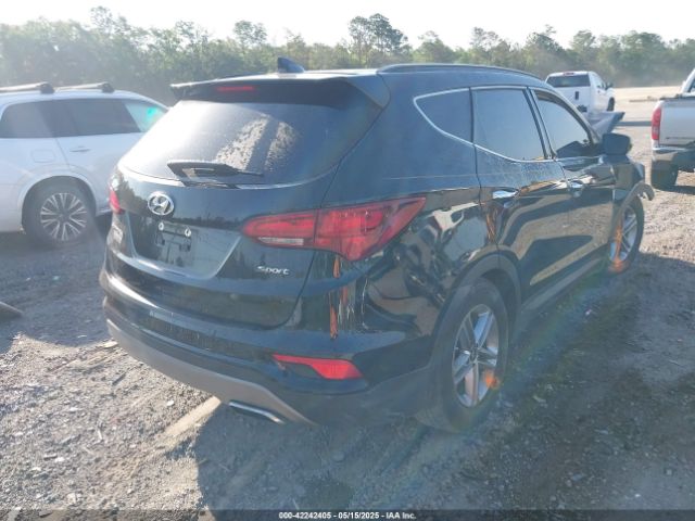 5NMZU3LB8HH031180 Hyundai Santa Fe Sport 2.4l