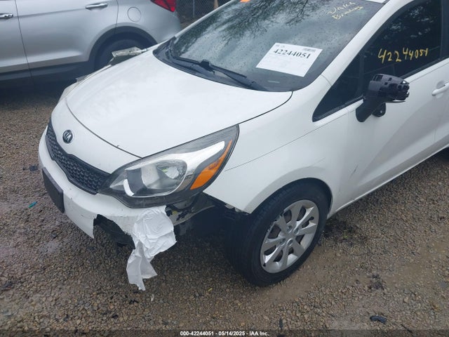 KNADM4A35H6117584 KIA RIO LX