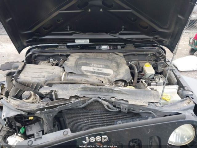 1C4HJWDG9EL268853 Jeep Wrangler Unlimited Sport