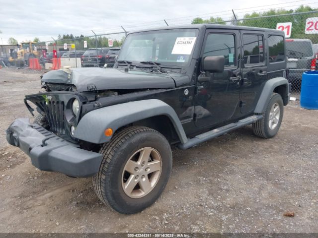 1C4HJWDG9EL268853 Jeep Wrangler Unlimited Sport