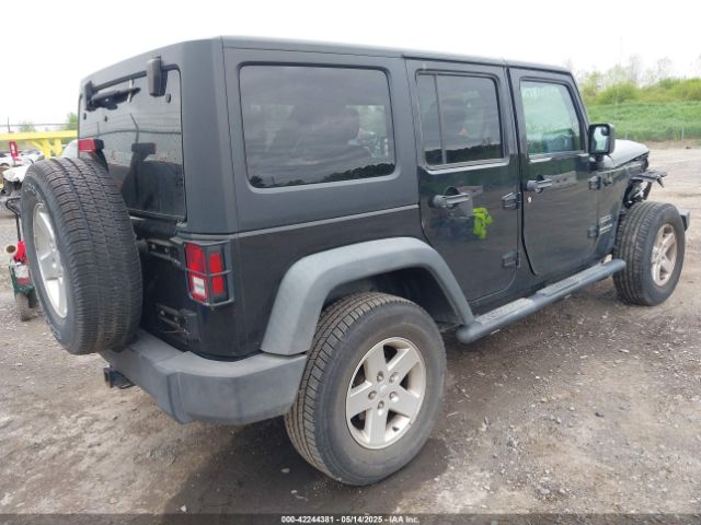 1C4HJWDG9EL268853 Jeep Wrangler Unlimited Sport
