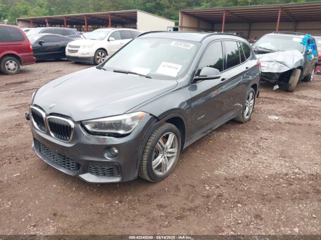 2018 BMW X1 WBXHT3C35J5F93138 Photo 1