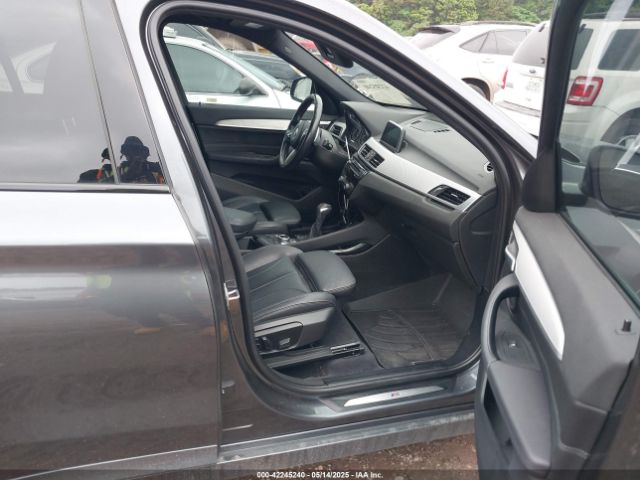 2018 BMW X1 WBXHT3C35J5F93138 Photo 4