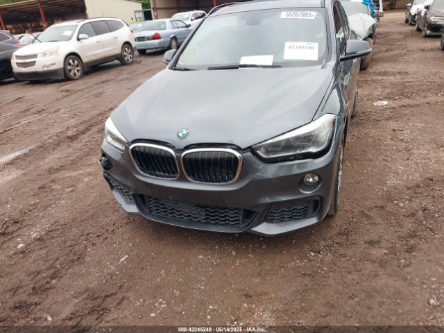 2018 BMW X1 WBXHT3C35J5F93138 Photo 5