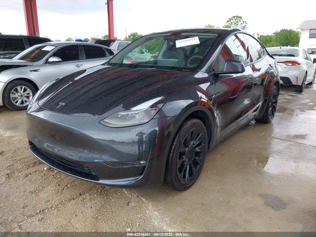 2024 TESLA MODEL Y 7SAYGAEE3RF039918 Photo 1