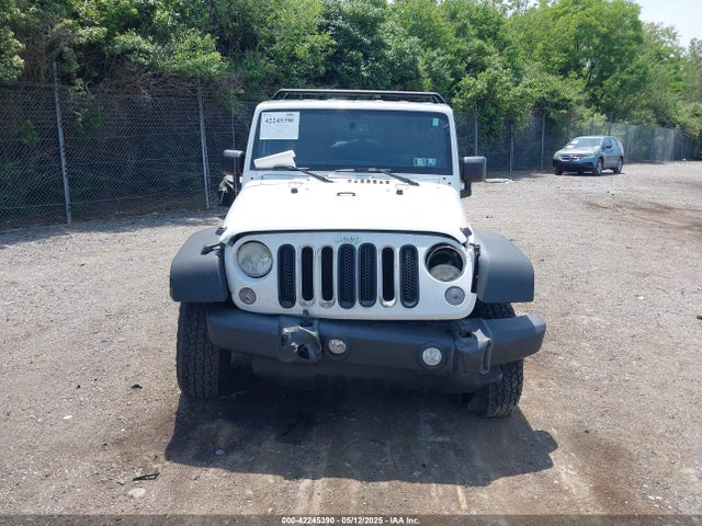 1C4BJWDG6EL115627 Jeep Wrangler Unlimited Sport