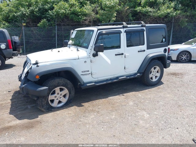 1C4BJWDG6EL115627 Jeep Wrangler Unlimited Sport