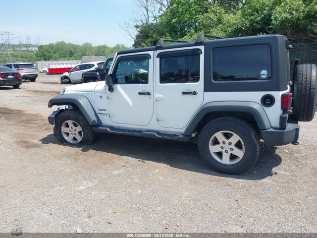 1C4BJWDG6EL115627 Jeep Wrangler Unlimited Sport