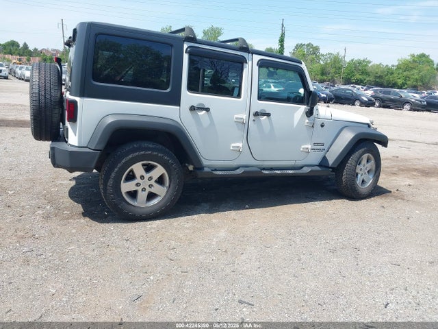 1C4BJWDG6EL115627 Jeep Wrangler Unlimited Sport