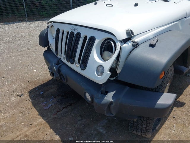 1C4BJWDG6EL115627 Jeep Wrangler Unlimited Sport
