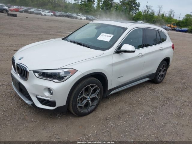 2018 BMW X1 WBXHT3C33J5L26657 Photo 1