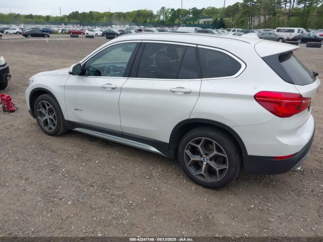 2018 BMW X1 WBXHT3C33J5L26657 Photo 2