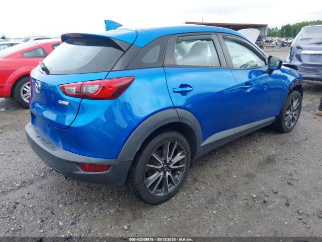 JM1DKFC7XH0171860 Mazda Cx-3 Touring