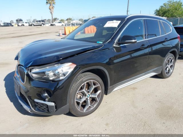 2019 BMW X1 WBXHU7C59K3H45957 Photo 1