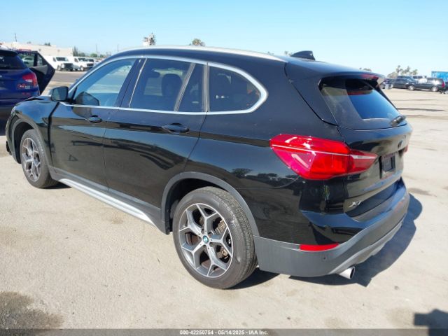 2019 BMW X1 WBXHU7C59K3H45957 Photo 2