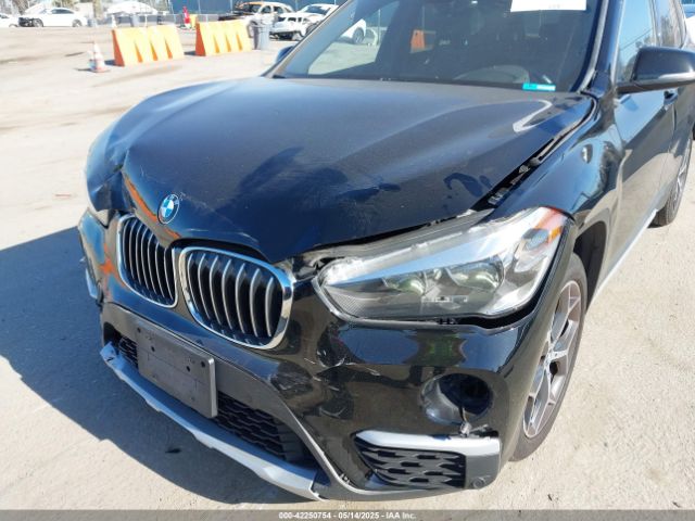 2019 BMW X1 WBXHU7C59K3H45957 Photo 5