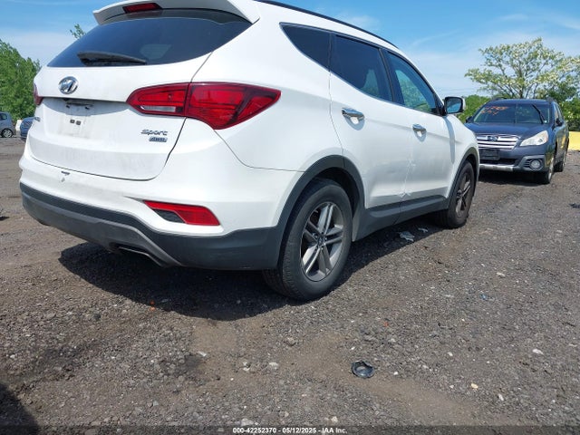 5XYZUDLBXHG410049 Hyundai Santa Fe Sport 2.4l